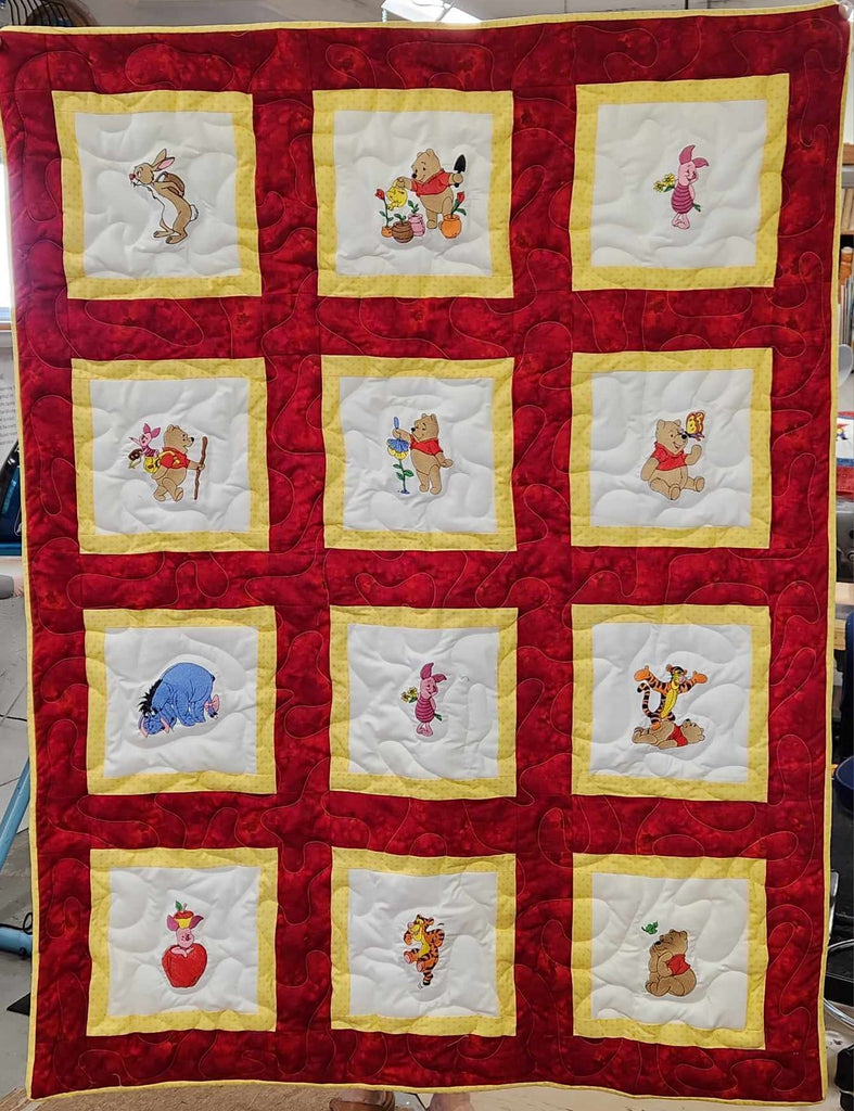 https://happycrafters.net/collections/baby-kid-sized-quilts/products/winnie-the-pooh